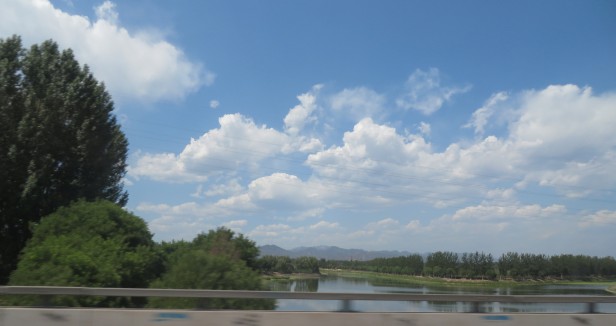This shows one of the few days of blue sky at the very northern of Beijing where there are mountains in the horizon.
