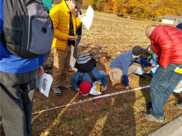 Stop 3. Dean pit (private property). Participants view a core sample obtained here to examine the stratigraphy (layers) found beneath this farm field. A gravel pit provides additional rock exposures.